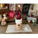 Whimsical Christmas elf decoartion that is made from a real dried gourd. Elf comes with a battery operated candle to light up the face.
